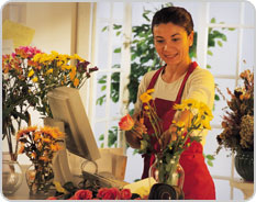 Florist in flower shop.