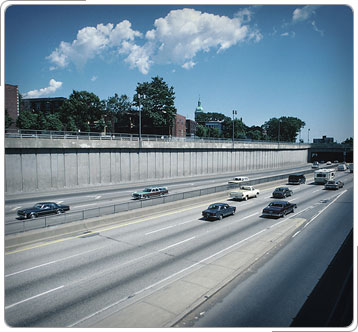 Vehicles driving on highway.