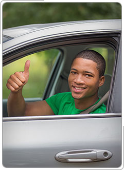 Thumbs up from car.